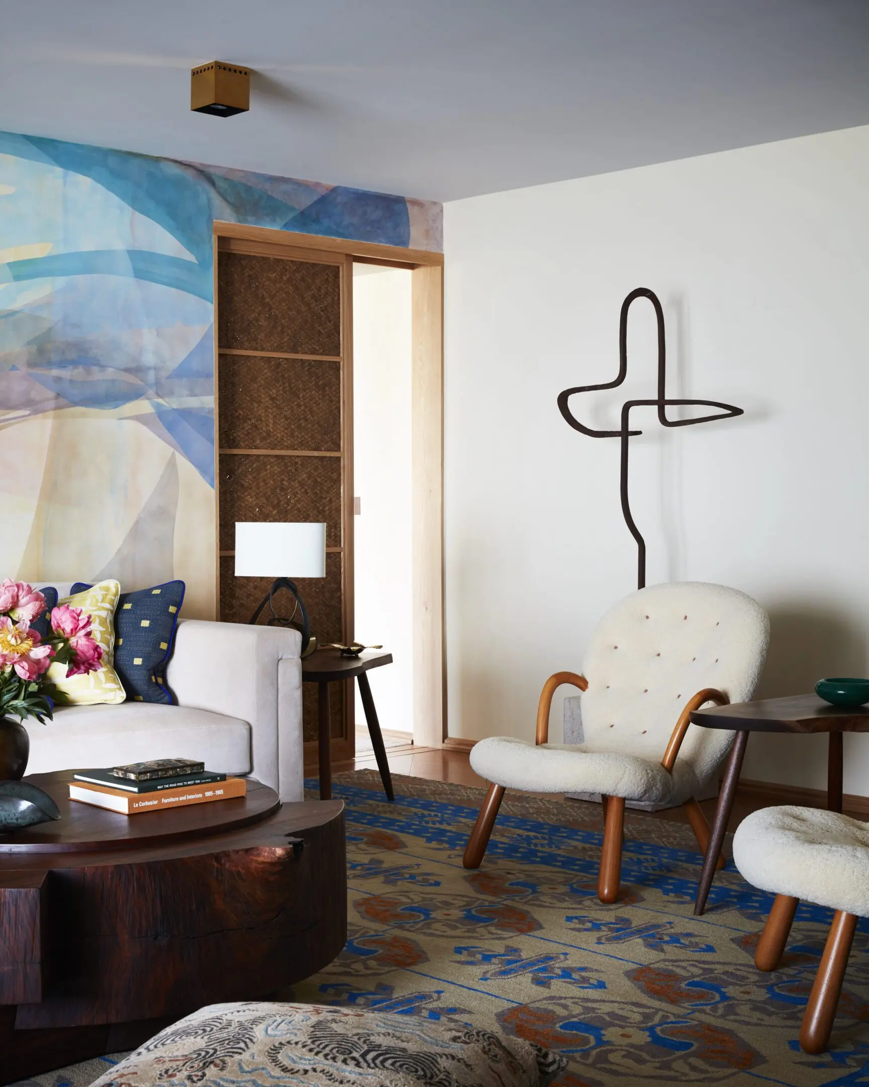 Cozy modern living room with artistic mural