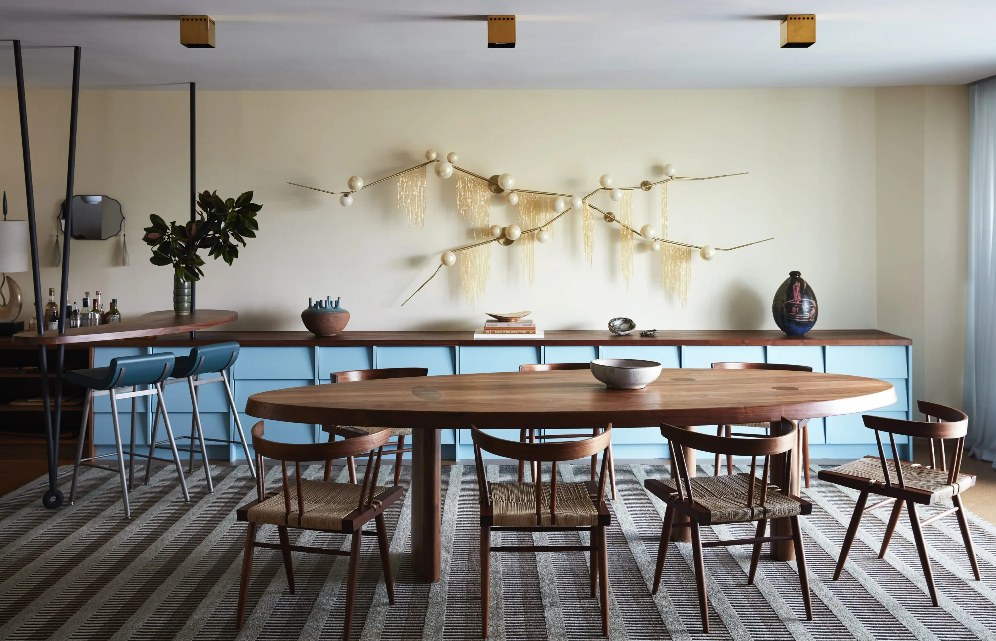 Modern dining room with oval wooden table