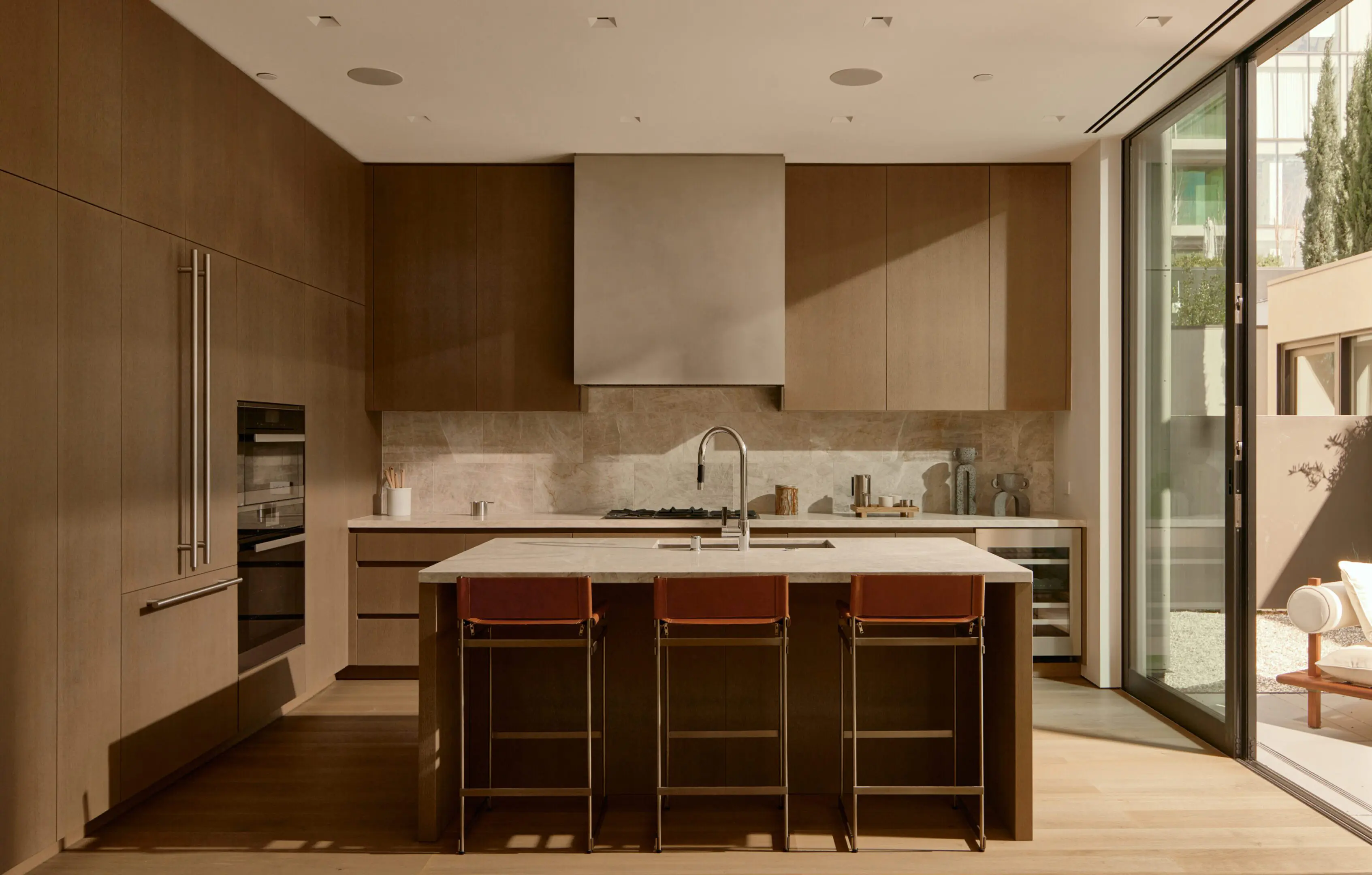 Modern wood kitchen with island and stools