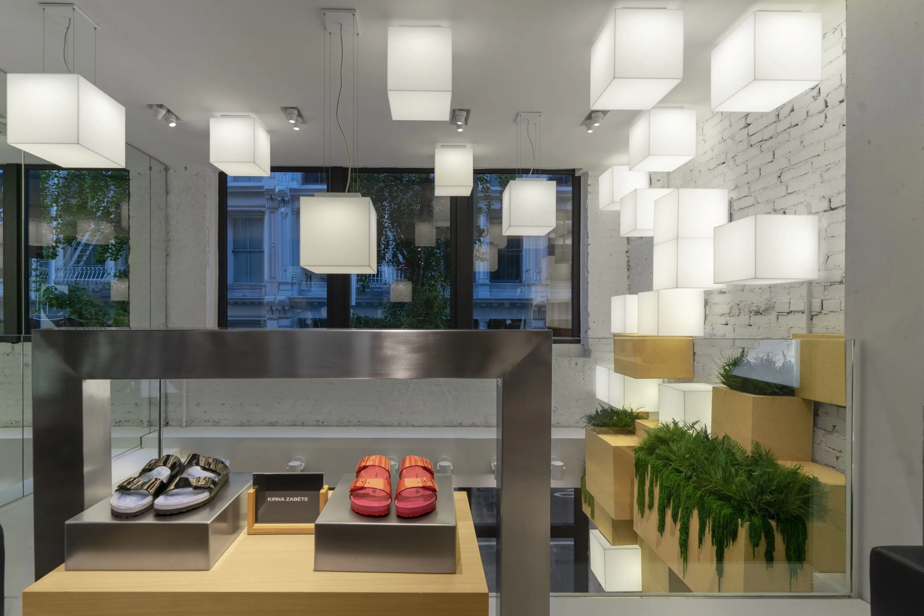 Modern boutique sneaker display with cube lights