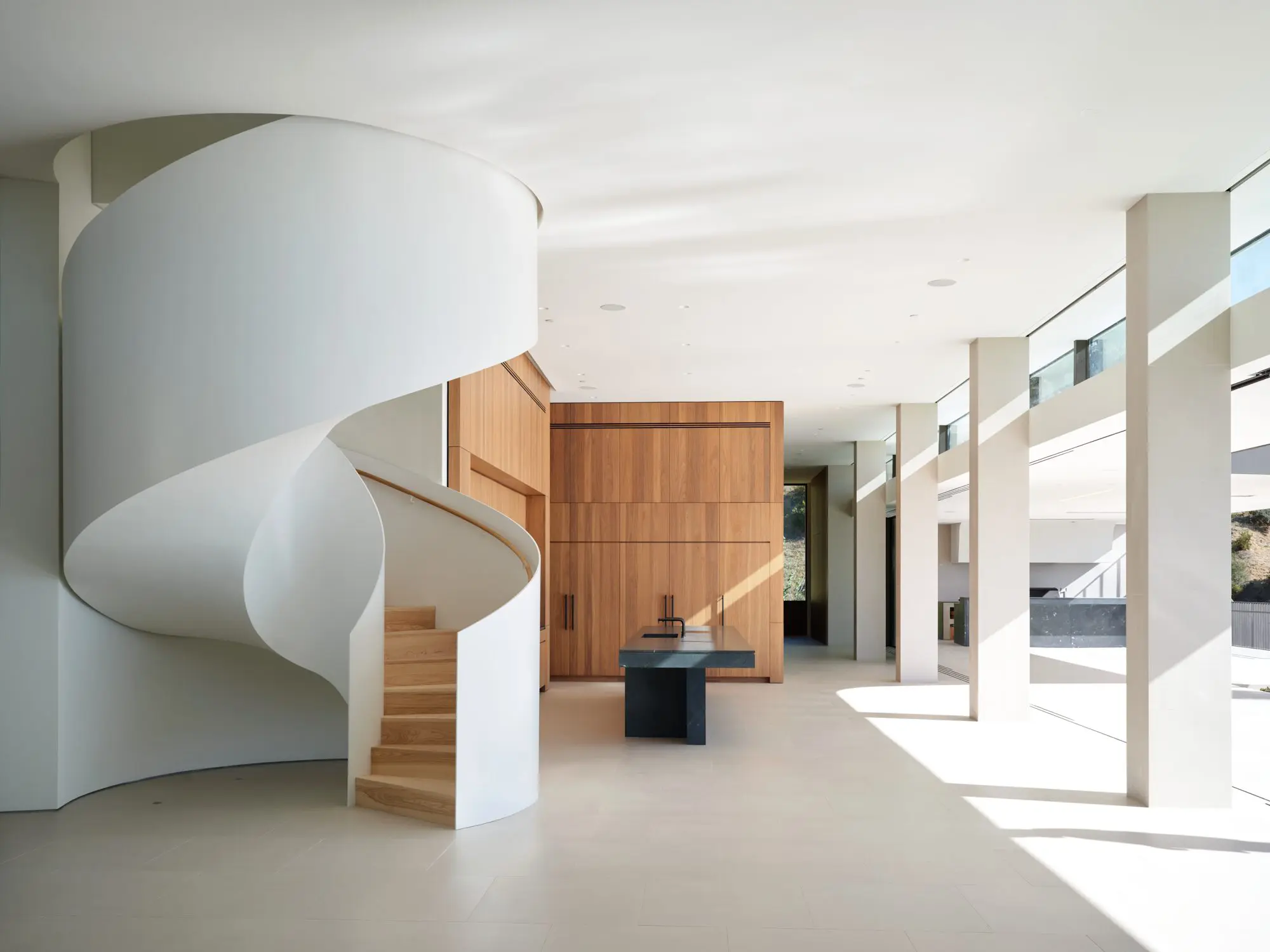 Modern interior with white spiral staircase